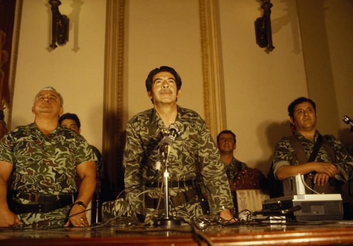 Gen. José Efraín Ríos Montt (center) at first press conference after seizing power in military coup. 23 March 1982, National Palace, Guatemala City, Guatemala. Photo courtesy of Jean-Marie Simon.